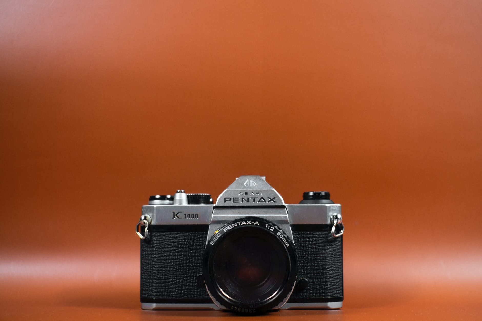 black and silver pentax camera